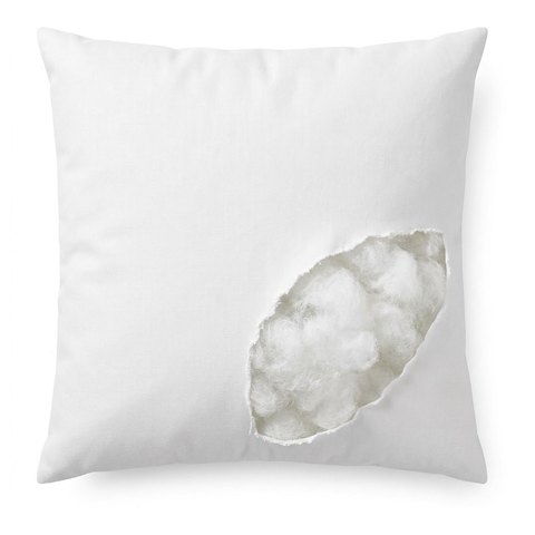 45 × 45 cm cushion insert, cut open to show the polyester fibre filling